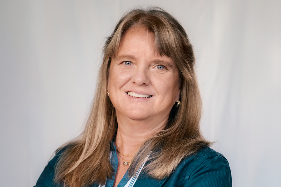 Porträtt av Ulrika Lundgren som ler mot kameran.